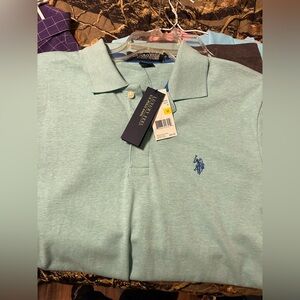 Brand new with tags never worn original soft knit polo.